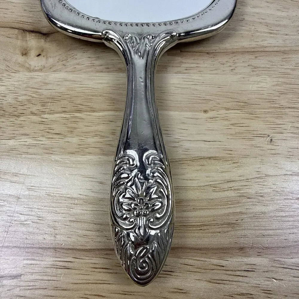 VINTAGE SILVERPLATE VICTORIAN STYLE VANITY HAND HELD MIRROR RAISED FLORAL DESIGN